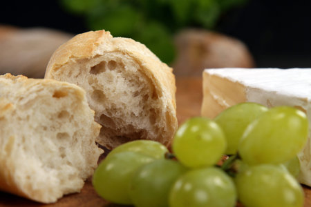 Food Products - cheese, bread and grapes
