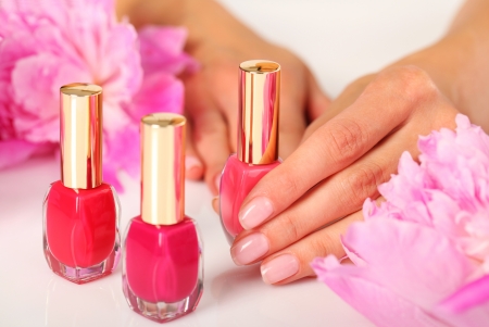 Woman in a nail salon receiving a manicureの写真素材