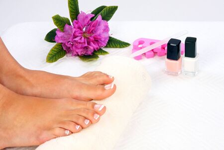 Beauty treatment photo of nice pedicured feetの写真素材