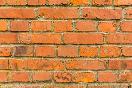 Old wall built of red brick