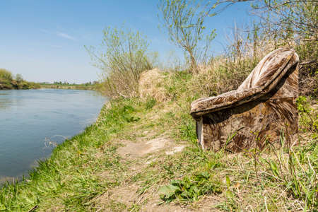 Comfortable place to rest and fishing on the riverの写真素材