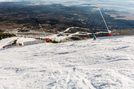 Tatranska Lomnica, Slovakia - December 26, 2015: Child during the descent on skis without poles.