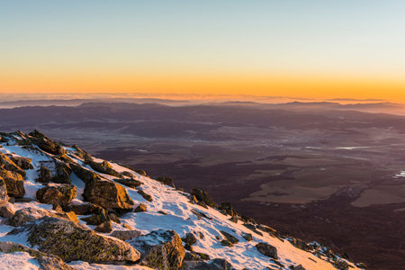 Slovakia at sunrise as seen from the mountains.
