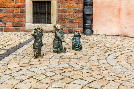 Wroclaw, Poland - August  05, 2016: Three figurines of dwarfs (Wroclaw?s dwarfs).のeditorial素材