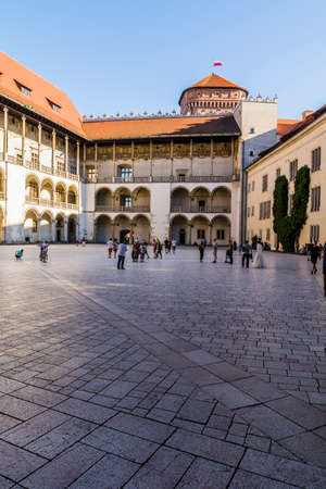 Krakow, Poland - August  26, 2016: Tourists on the square castle on Wawel.のeditorial素材