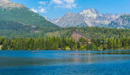 Strbske Pleso, Slovakia - September 12, 2016: Tourists from the boat admiring mountain peaks.のeditorial素材