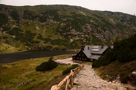 Karpacz, Poland - August 24, 2012: Mountain cottage (Samotnia) on the Small Pond in the Giant Mountains.のeditorial素材