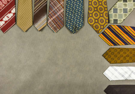 Half-frame with a set of ties in various patterns and widths.の写真素材