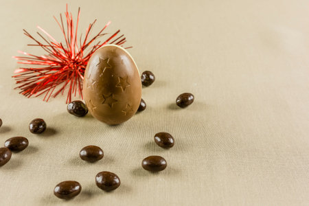 Easter chocolate egg surrounded by small ones.
