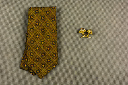 Attributes of an elegant man - tie and cufflinks.