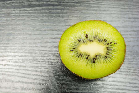 Kiwi fruit cut in half view from above.の写真素材