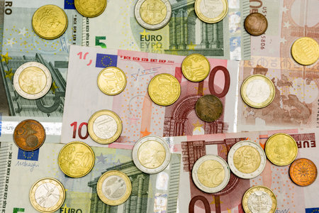 Euro banknotes and coins. Money as a background.