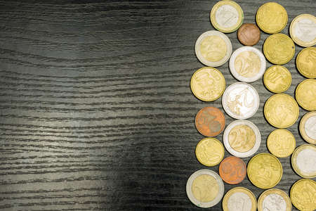 Euro coins in various denominations on the table.の写真素材