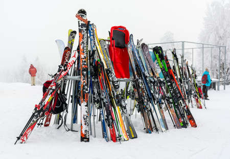 Zdiar, Slovakia - February 11, 2018: Skis and poles based on a stand.のeditorial素材