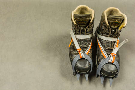 Niedomice, Poland - February 14, 2018: Hiking boots with classic binding crampons.のeditorial素材