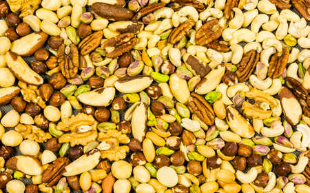 Abstract mix of nuts as a background, texture or pattern.の写真素材