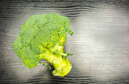 Green broccoli on the table. View from above.の写真素材