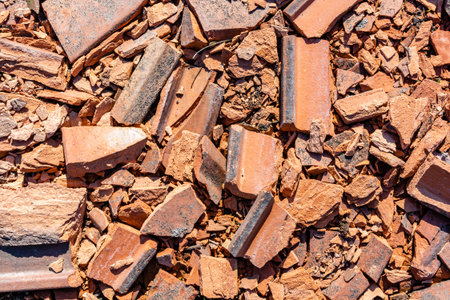 Tile broken into pieces as a texture.の写真素材