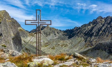 Metal cross on the top in the Slovak Tatras.の写真素材