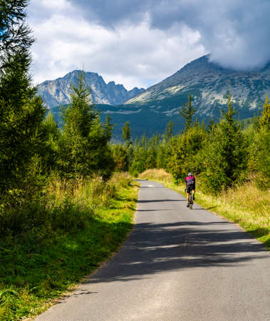 Tatranska Polianka, Slovakia - September 12, 2020: Athlete during cycling training in the mountains. Wielicka Valley (Velicka dolina), Tatra Mountains. Slovakia.のeditorial素材