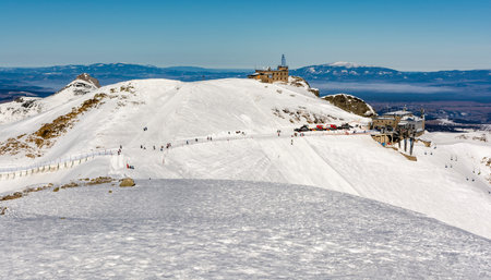 Zakopane, Poland - March 02, 2021: Kasprowy Wierch (Kasprov vrch) peak with ski and meteorological infrastructure. View during the winter season. Tatra Mountains.のeditorial素材