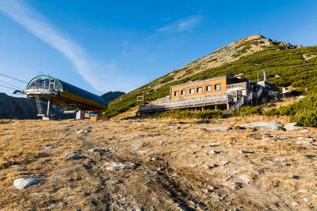 Strbske Pleso, Slovakia - November 15, 2021: The building of the Shelter in Solisko (Shelter under Solisko, cottage under Soliskom) and the mountain station of the chairlift.のeditorial素材