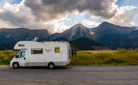 Zdiar, Slovakia - September 12, 2021: Fiat Ducato motorhome version with bikes on the trunk, parked in the parking lot overlooking the Belianske Tatras.のeditorial素材