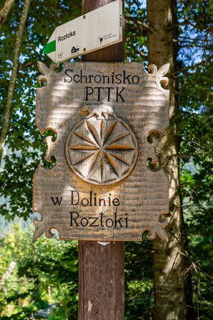 Palenica Bialczanska, Poland - September 09, 2021: Decorative plaque on the trail to the PTTK Shelter in the Roztoka Valley. Tatra Mountains.のeditorial素材