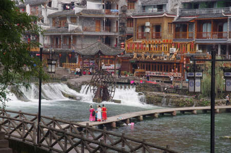 View of beautiful river and ancient buildings in an old townのeditorial素材