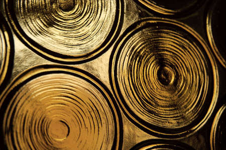 Abstract backgound, golden glass circles of a doorの写真素材