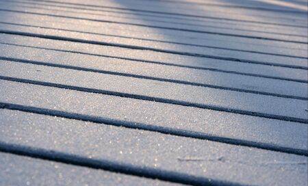 Small perticles of frost on lumber barsの写真素材