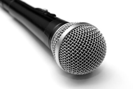Closeup of a dynamic microphone isolated on whiteの写真素材