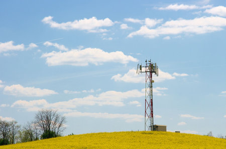 Gsm transmitter on a yellow rape field