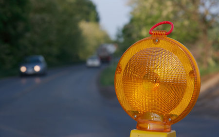 Yellow warning light at a road construction