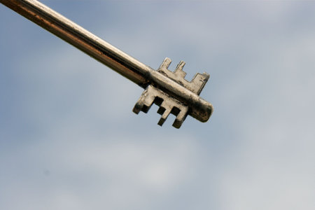 Detail of a key against blue skyの写真素材