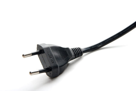 Black electric plug isolated on white