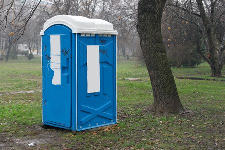 Blue mobile toilet cabin in a parkの写真素材