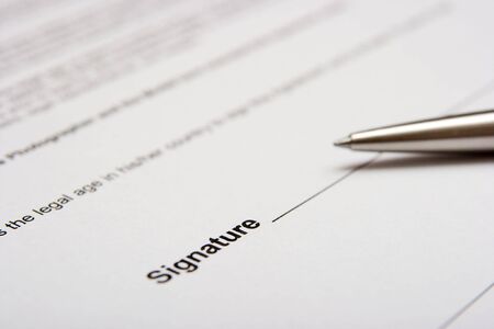 Contract about to being signed with a penの写真素材