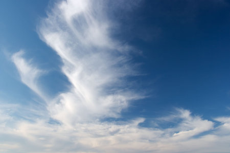 White cloud formations on blue sky