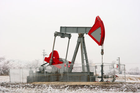 Oil well on a winter landscape