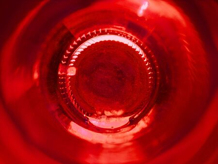 Abstract red background (bottom of a bottle)の写真素材