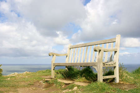 Bench in a nice coastal sceneryの写真素材