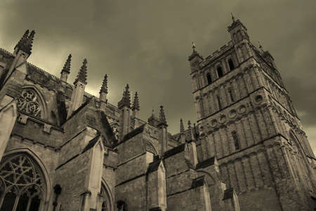 Medieval cathedral with gloomy sky (Exeter, United Kingdom)の写真素材