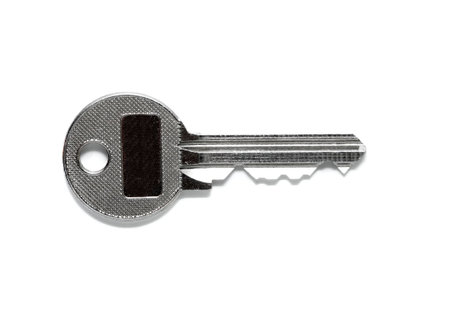 Shiny key isolated on white background