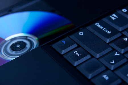 Detail of a laptop with open cd trayの写真素材