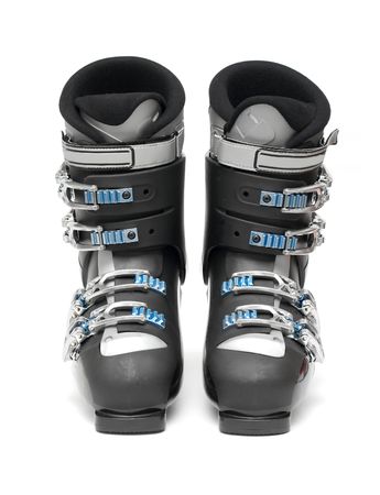 A pair of ski boots isolated on whiteの写真素材