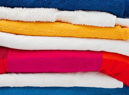 A pile of colorful towelsの写真素材
