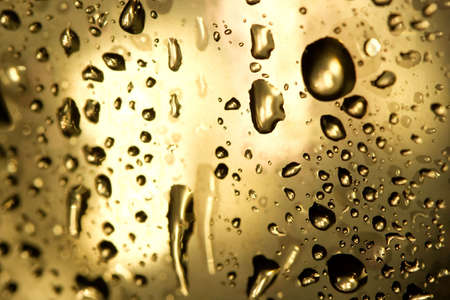 Background image with droplets on a windowの写真素材
