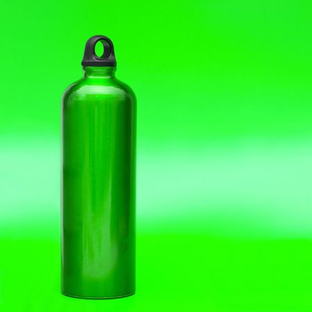 Aluminum water flask on green backgroundの写真素材