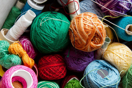 Rows of colorful threads in a pile